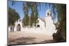 Two Men Approach the White Adobe Iglesia San Pedro Church, San Pedro, Chile, South America-Kimberly Walker-Mounted Premium Photographic Print