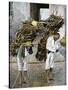 Two Men Carrying Bundles of Wood on their Backs, Mexico, Early 20th Century-null-Stretched Canvas