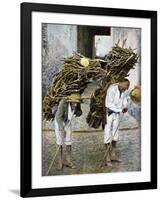 Two Men Carrying Bundles of Wood on their Backs, Mexico, Early 20th Century-null-Framed Giclee Print