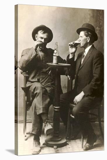 Two Men Drinking Beer-null-Stretched Canvas