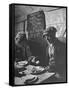 Two Men Eating American Food at a Liverpool Communal Feeding Centre-Hans Wild-Framed Stretched Canvas