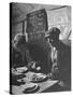 Two Men Eating American Food at a Liverpool Communal Feeding Centre-Hans Wild-Stretched Canvas