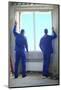 Two Men in Working Clothes Set New Window Frame into the Window Opening-Paha_L-Mounted Photographic Print