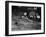 Two Men Lying on the Floor, Constructing a Railroad, at Toy Train Society-Alfred Eisenstaedt-Framed Photographic Print