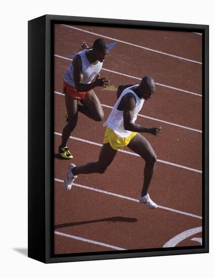 Two Men Racing on a Track-null-Framed Stretched Canvas