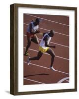 Two Men Racing on a Track-null-Framed Photographic Print