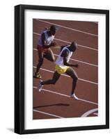 Two Men Racing on a Track-null-Framed Photographic Print