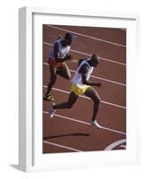 Two Men Racing on a Track-null-Framed Photographic Print