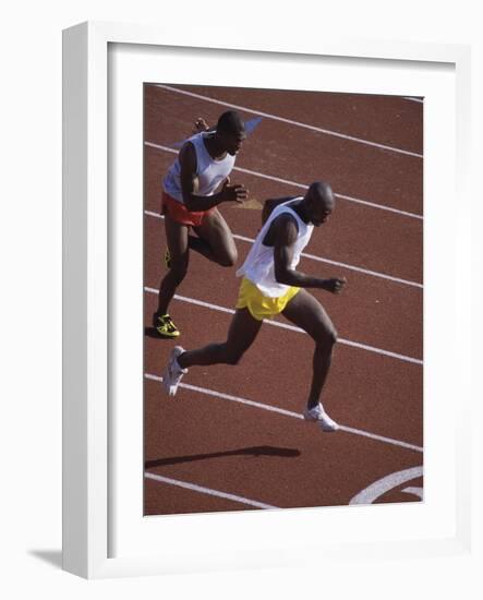 Two Men Racing on a Track-null-Framed Photographic Print