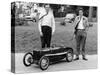 Two Men Standing by a Miniature Sunbeam Pedal Car, 1960S-null-Stretched Canvas