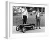 Two Men Standing by a Miniature Sunbeam Pedal Car, 1960S-null-Framed Photographic Print