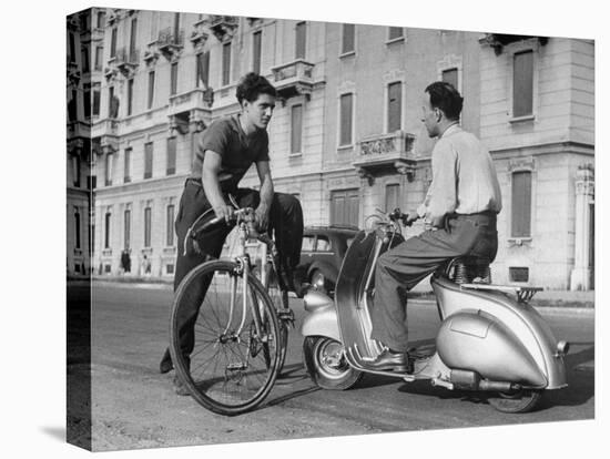 Two Men Talking in Street with Vespa Scooter and Bicycle-Dmitri Kessel-Stretched Canvas