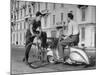 Two Men Talking in Street with Vespa Scooter and Bicycle-Dmitri Kessel-Mounted Photographic Print