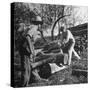 Two Men Using a Crosscut Saw on a Log-null-Stretched Canvas