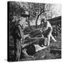 Two Men Using a Crosscut Saw on a Log-null-Stretched Canvas