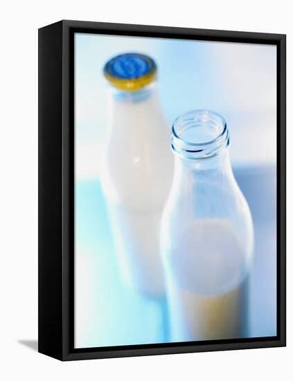 Two Milk Bottles, One Opened-Klaus Arras-Framed Stretched Canvas