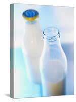 Two Milk Bottles, One Opened-Klaus Arras-Stretched Canvas