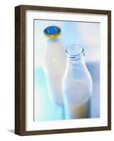 Two Milk Bottles, One Opened-Klaus Arras-Framed Photographic Print