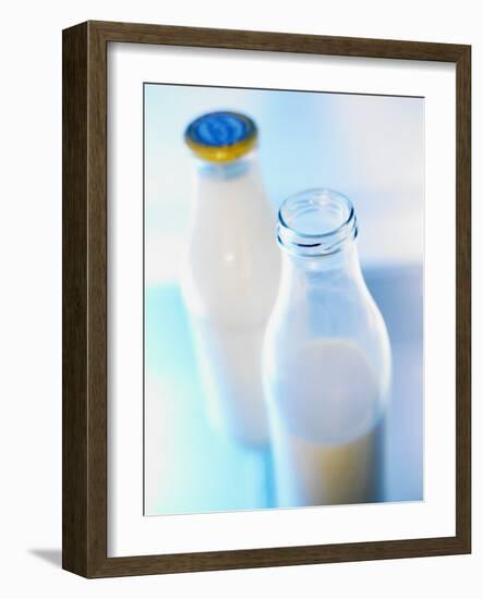 Two Milk Bottles, One Opened-Klaus Arras-Framed Photographic Print