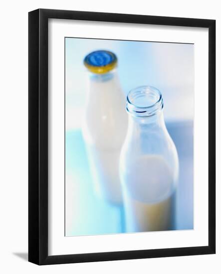 Two Milk Bottles, One Opened-Klaus Arras-Framed Photographic Print