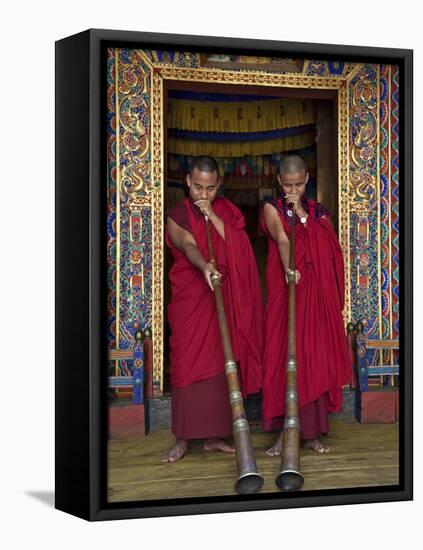Two Monks Blow Long Horns Called Dung-Chen, at the Temple of Wangdue Phodrang Dzong (Fortress)-Nigel Pavitt-Framed Stretched Canvas