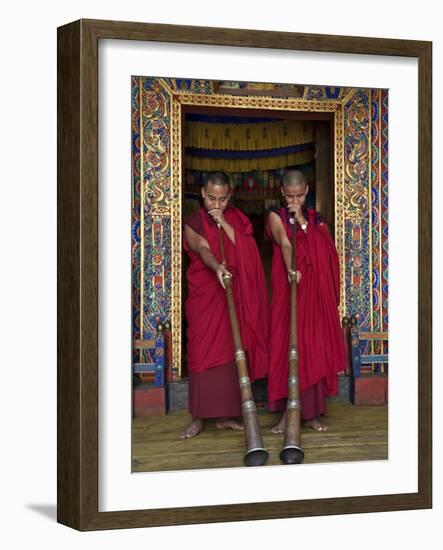 Two Monks Blow Long Horns Called Dung-Chen, at the Temple of Wangdue Phodrang Dzong (Fortress)-Nigel Pavitt-Framed Photographic Print