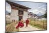 Two Monks Dressed in Traditional Red Access the Punakha Dzong, Punakha-Roberto Moiola-Mounted Photographic Print