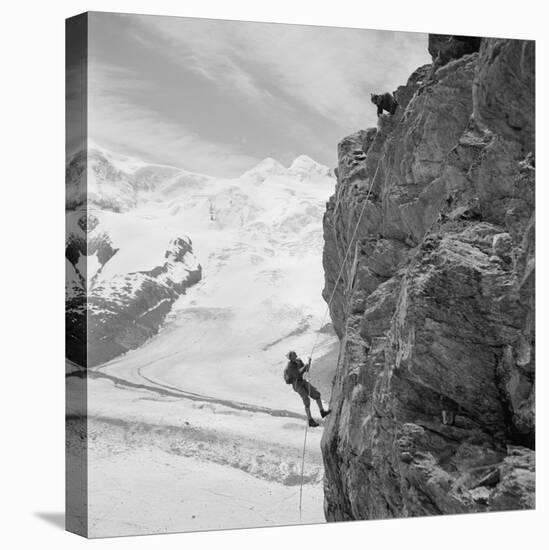 Two Mountain Climbers on the Side of a Mountain in Zermatt, Switzerland, 1954-null-Stretched Canvas