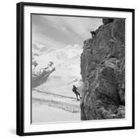 Two Mountain Climbers on the Side of a Mountain in Zermatt, Switzerland, 1954-null-Framed Photo