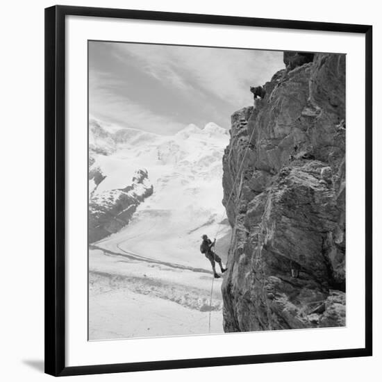 Two Mountain Climbers on the Side of a Mountain in Zermatt, Switzerland, 1954-null-Framed Photo