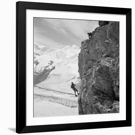 Two Mountain Climbers on the Side of a Mountain in Zermatt, Switzerland, 1954-null-Framed Photo