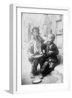 Two Neapolitan Children Slurp Down Spaghetti-null-Framed Art Print