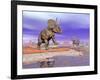 Two Nedoceratops Next to Water in a Colorful Rocky Landscape-null-Framed Art Print