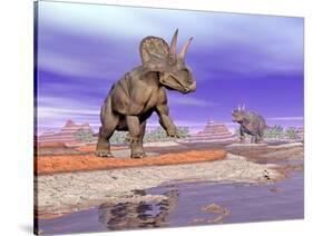 Two Nedoceratops Next to Water in a Colorful Rocky Landscape-null-Stretched Canvas