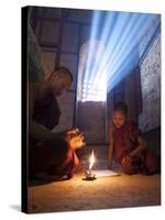 Two Novice Monks Reading Buddhist Texts Inside a Pagoda at Bagan in the Country of Burma (Myanmar)-Kyle Hammons-Stretched Canvas