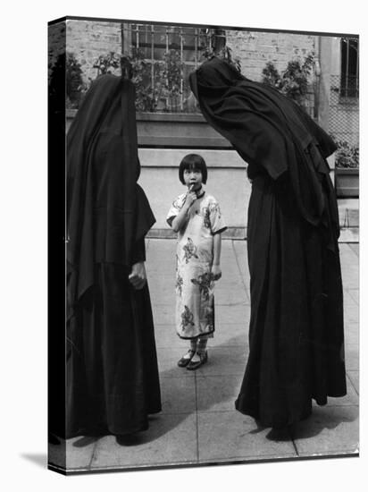 Two Nuns Questioning a Little Chinese Girl at the American Mission School-Alfred Eisenstaedt-Stretched Canvas