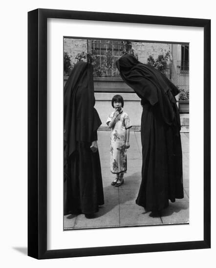 Two Nuns Questioning a Little Chinese Girl at the American Mission School-Alfred Eisenstaedt-Framed Premium Photographic Print
