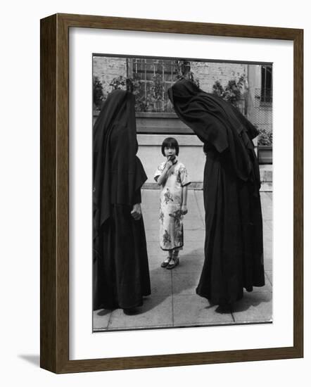 Two Nuns Questioning a Little Chinese Girl at the American Mission School-Alfred Eisenstaedt-Framed Photographic Print