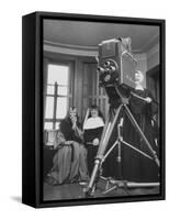 Two Nuns Smiling from the Wings While the Third Is Operating the Large TV Camera-null-Framed Stretched Canvas