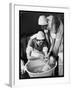 Two Nurses Bath a Baby-null-Framed Art Print