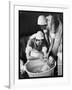 Two Nurses Bath a Baby-null-Framed Art Print