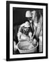 Two Nurses Bath a Baby-null-Framed Art Print