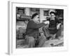 Two Older Basque Men Sitting on a Porch Toasting, as They Prepare to Drink Together-Dmitri Kessel-Framed Photographic Print