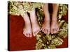 Two Pair of Feet of Small Children with Textile Spread around Them-Winfred Evers-Stretched Canvas