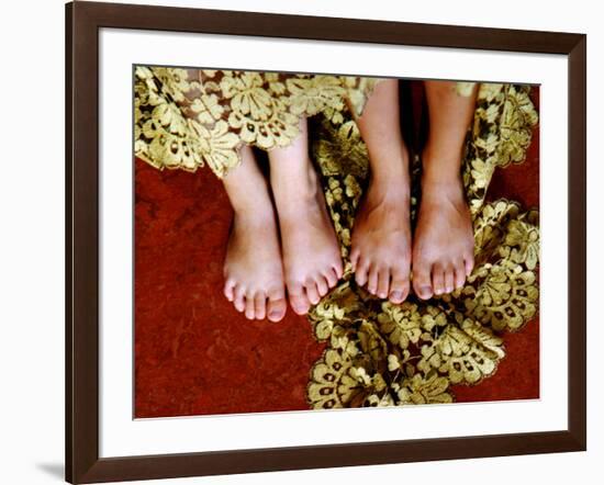 Two Pair of Feet of Small Children with Textile Spread around Them-Winfred Evers-Framed Photographic Print