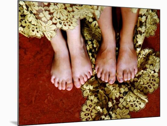 Two Pair of Feet of Small Children with Textile Spread around Them-Winfred Evers-Mounted Photographic Print
