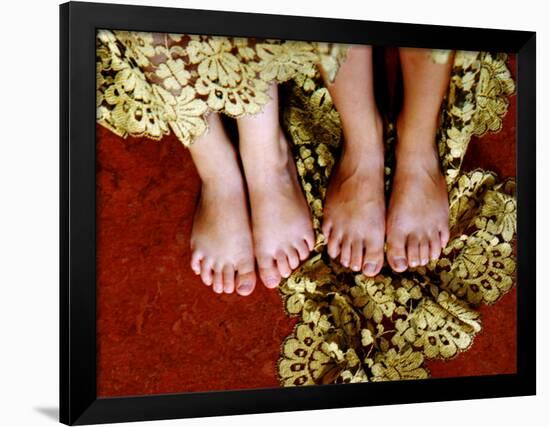 Two Pair of Feet of Small Children with Textile Spread around Them-Winfred Evers-Framed Photographic Print