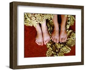 Two Pair of Feet of Small Children with Textile Spread around Them-Winfred Evers-Framed Photographic Print