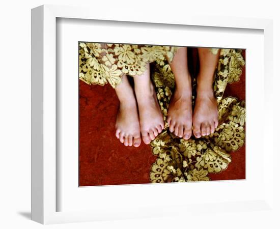 Two Pair of Feet of Small Children with Textile Spread around Them-Winfred Evers-Framed Photographic Print