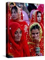 Two Pakistani Brides, Smile During a Mass Wedding Ceremon-null-Stretched Canvas